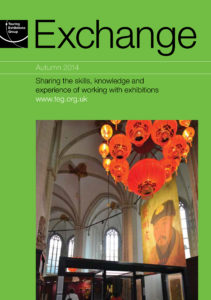 Front cover of Exchange Autumn 2014 with photograph of inside of a building showing the roof and red lighting on green background